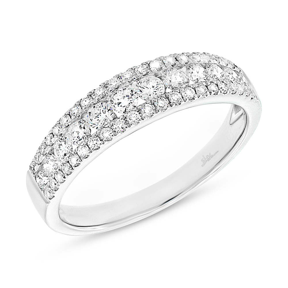 14 Karat white gold band with three row round diamonds