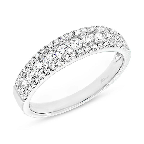 14 Karat white gold band with three row round diamonds