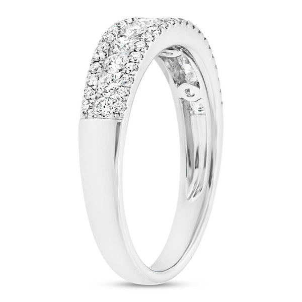 14 Karat white gold band with three row round diamonds