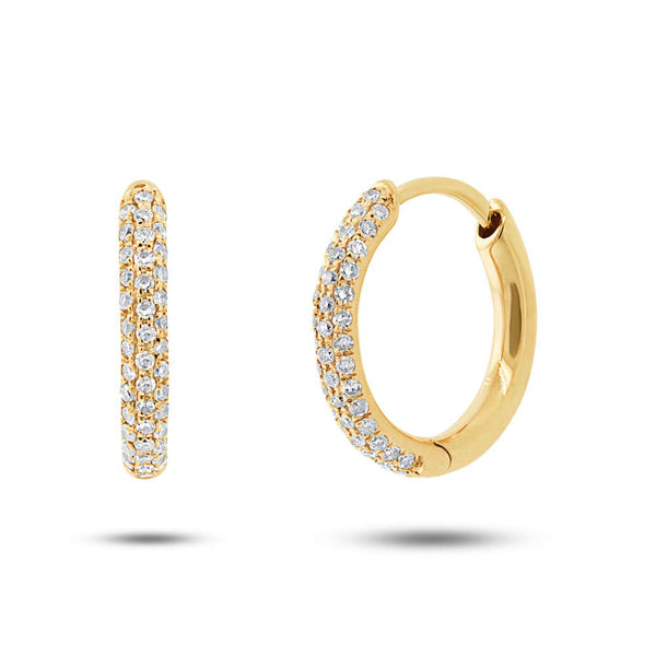 14 Karat gold huggie hoop earrings with three row diamonds