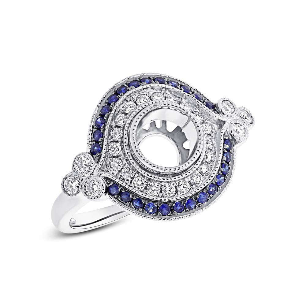 14 karat vintage engagement ring with round halo diamonds & natural sapphires