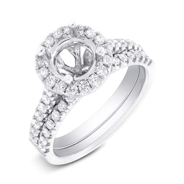 14 karat wedding ring with round halo and white diamonds